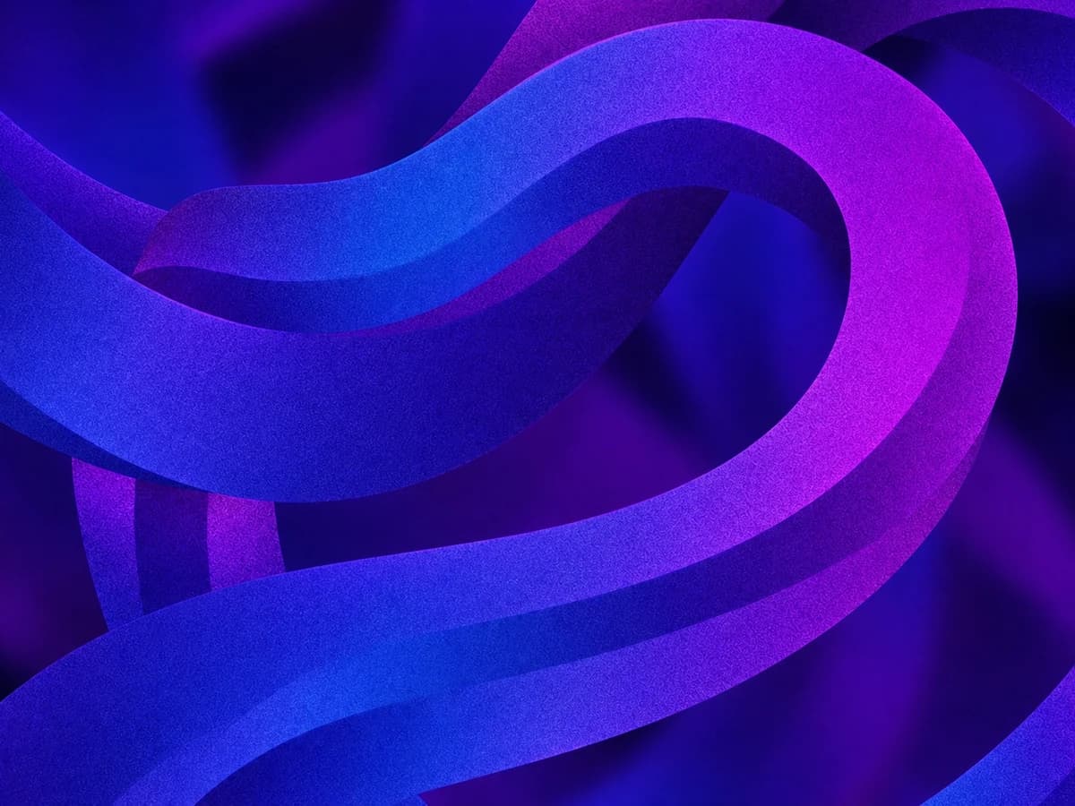 Cintas abstractas violetas, azules y magenta entrelazadas